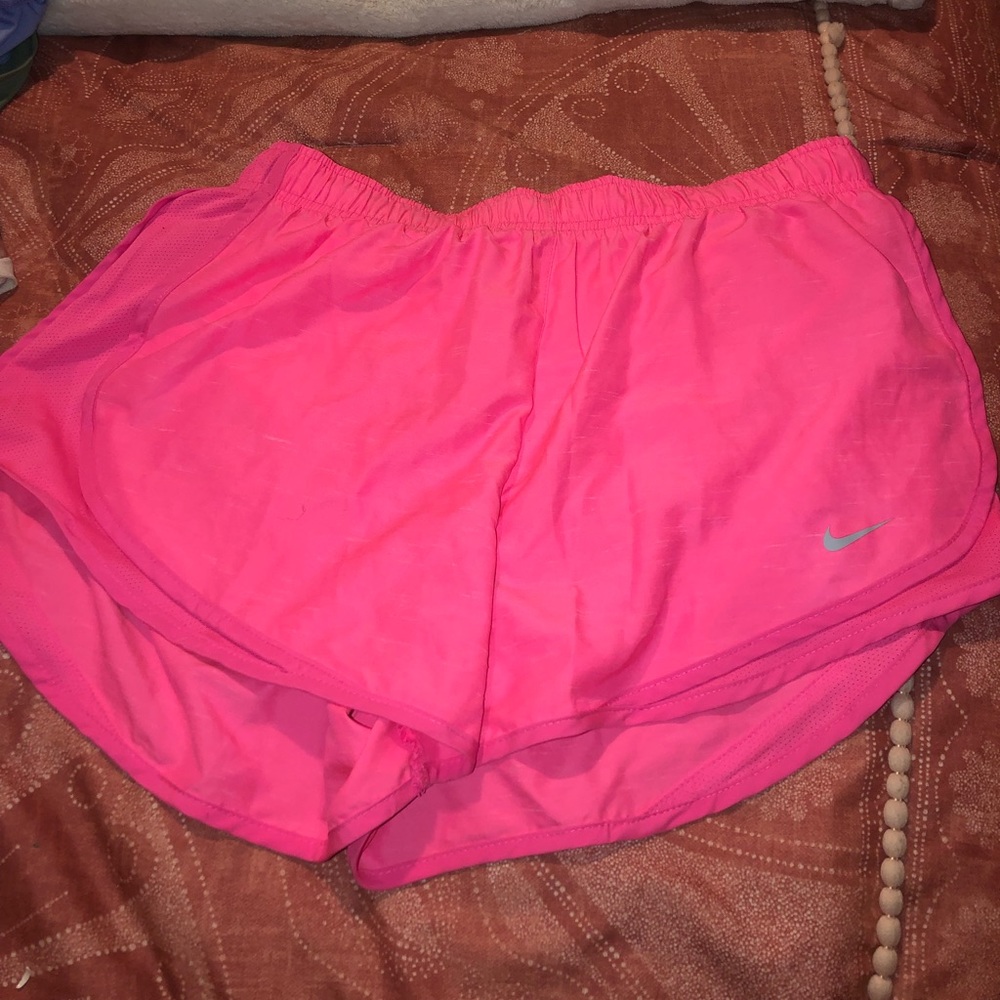Hot pink Nike running shorts